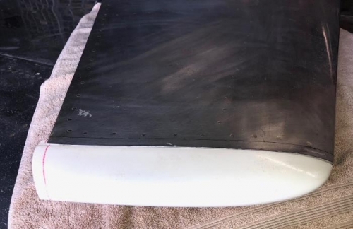 Extra 1/2 inch at rear needs trimmed to some kind of shape.