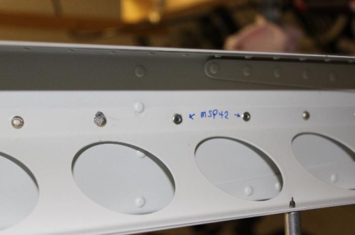 MSP 42 rivets used for two holes that were hard to rivet by myself. Rivet to left was  replaced.