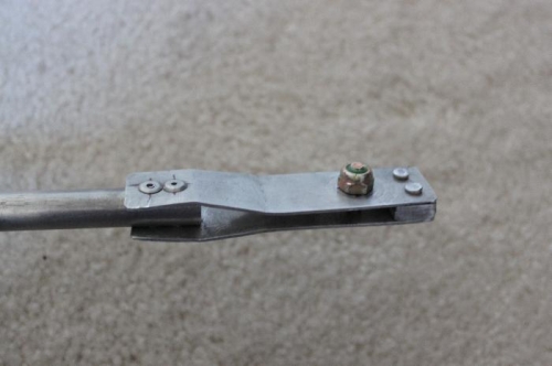 This is the locking portion. That bolt slips into the different notches I cut into the curved part.