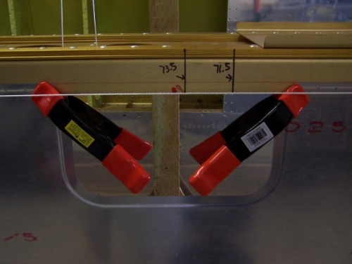 Pre flanged access opening in wing skin.  Rib at 73.5 (#9) gets much work done to it.