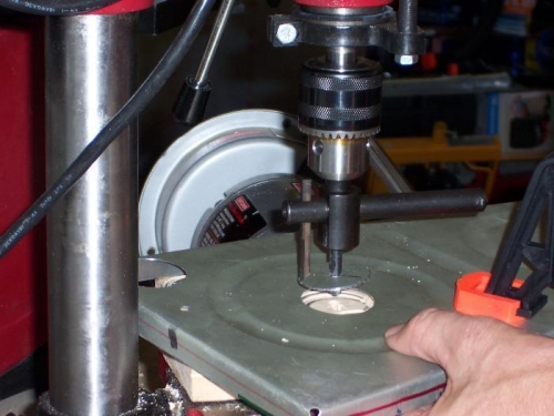 Cut two 1.5 inch holes in all inside tank ribs.