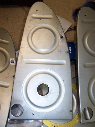 1.5 in holes(2) 1/4 in holes(2), 7/16 in hole(1) in each inside rib.