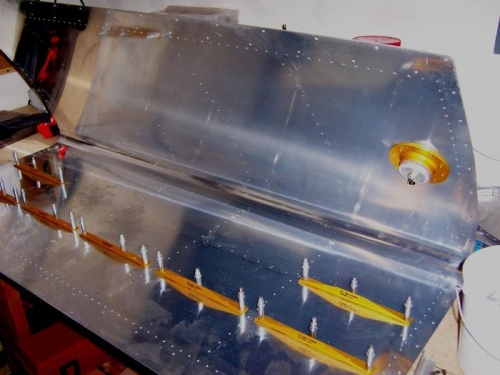 3 stiffeners missing.  1 good one is being used as a pattern for 2 fabricated ones.