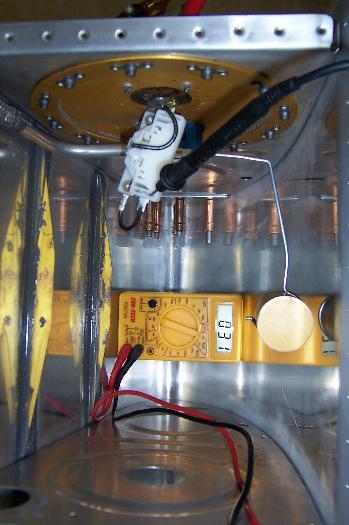 Bent, clipped and fit fuel float arm