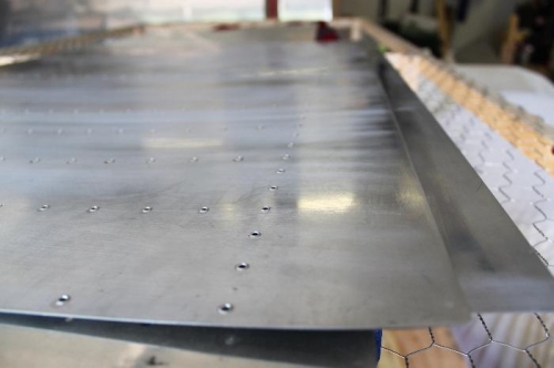 Scuffed inside skin to ready for priming