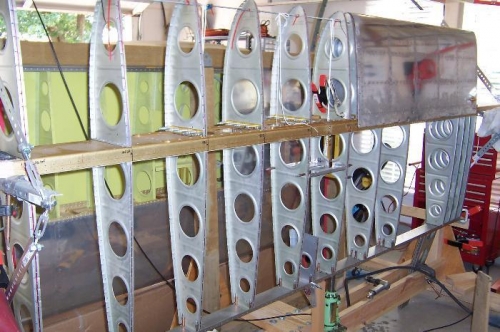 Set the tank back on to make room for the other work.