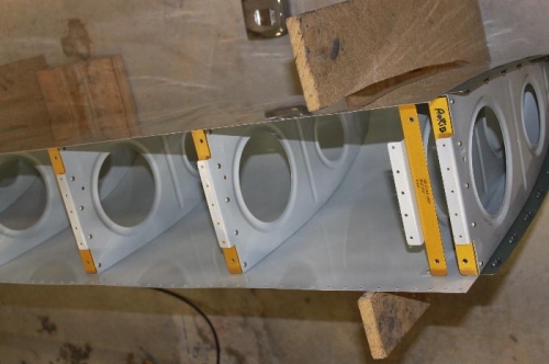 Inboard most rib with fuel tank attach plate riveted together.