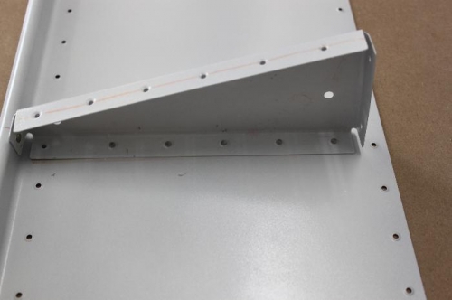 This gets repeated for al linner ribs.  Don't rivet either outer rib yet.