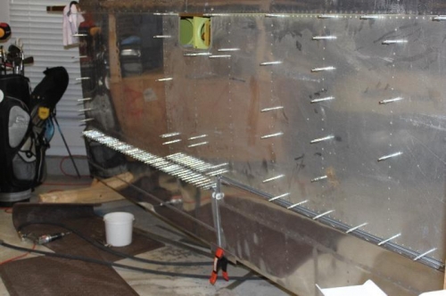 Left wing flap final drilled.