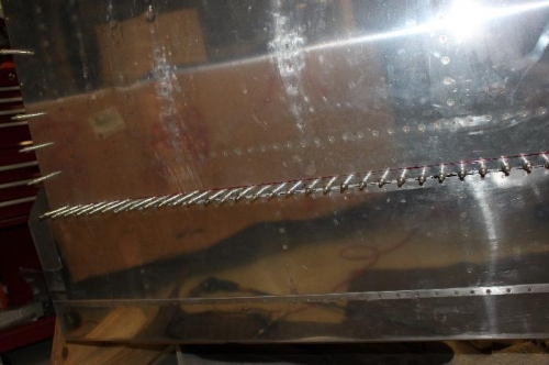 14 9/16 from trailing edge of bottom side of flap to center of rear wing spar rivet holes.