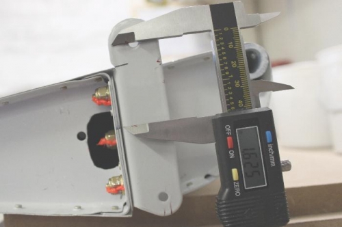 1.625 inched centerline of tooling holes to centerline lower attach hole per plans.