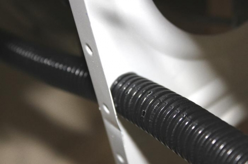 I will put proseal or RTV on the conduit straddling the holes.