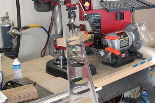 2 1/4 inch diameter holes set on a pattern of 5 1/2