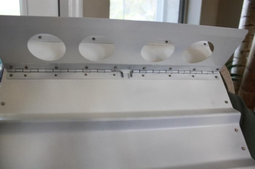 Seat back securing hardware