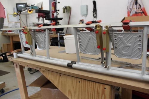 Mount the assembly upside down and center all pedals with a piece of angle plus clamps.