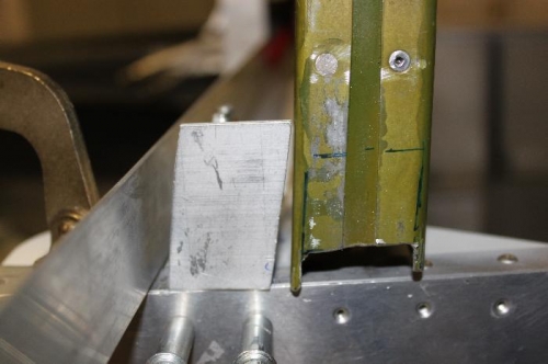 This cutout allows the curved part of the 3/16 outer angle to fit under the roll bar.