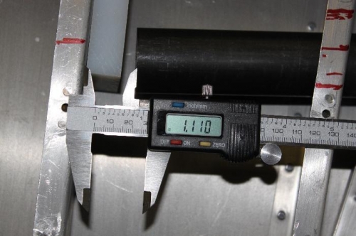 1 1/8 to 1 3/16 short due to the angle on the floor rib.