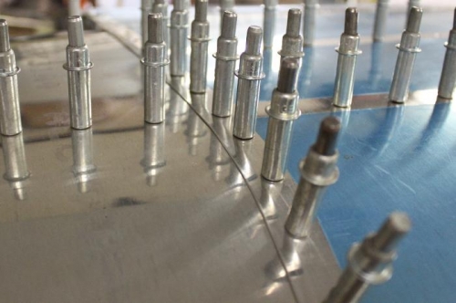 Rolled edge with Cleaveland tool and it works really well.  This is the top skin overlapping the rear