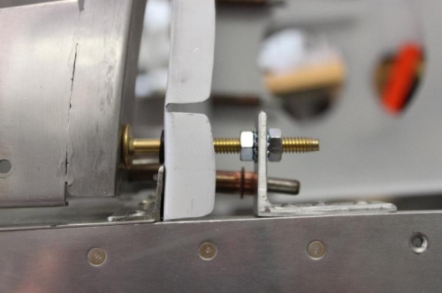 Co Pilot side.  The furniture bolts have dead flat heads to match up to frame skin perfectly.