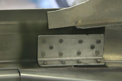 Side frame joined to forward frame - pilot side