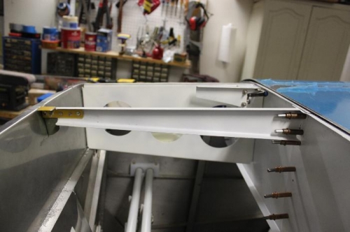 Center Top Rib extended and riveted together.