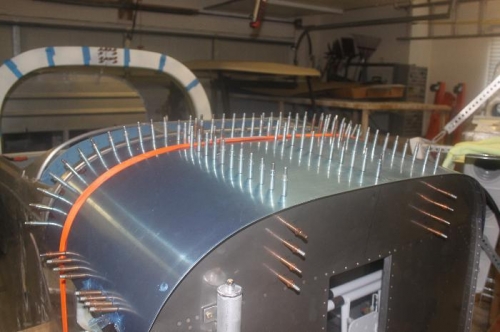 See the copper #30 clecoes in the two short ribs on top?  My bad. Wrong pilot bit used. Its OK to go.