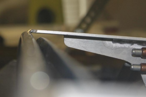 Pilot Side weldment is crap. See how high above tube it is?