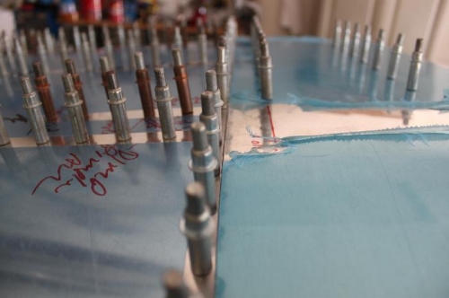 I spaced the canopy skin .035 apart from the forward top skin and started drilling it.