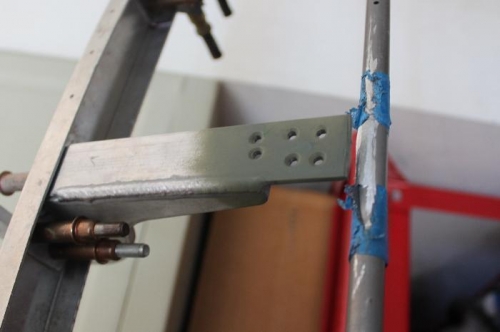 Dremel cutoff wheel carefully cut the bad weld. Then vixen filed the weld off the tube top.