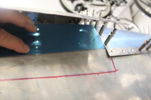 Red shows canopy skin overlap.  I slid the side skin up in there to see if flush fit might work. Yep.