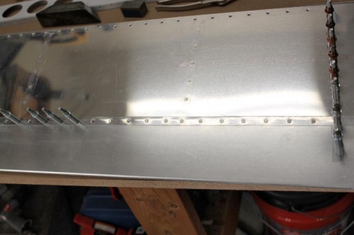 Rivet  the overlapping skins