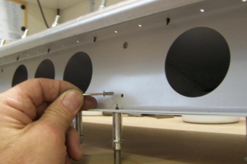 LP4 rivets attach spar to inner ribs.