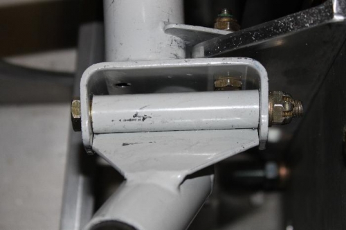 Notice the slight (1/32-1/16) undersize of the white control stick vs the brass bearing.