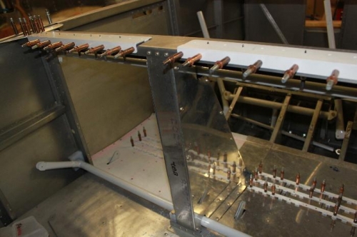 Flap weldment fit fine. All nutplates installed in flap housing and floor.