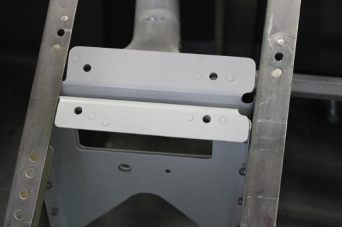 Pilot's crotch belt anchor .