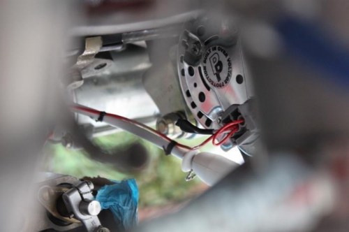 Lacing chord along its route secures it to the Alternator wire.