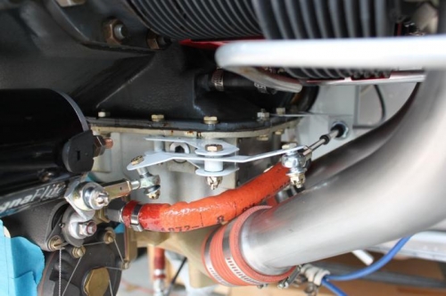 Figured out a new routing of the fuel line and reclamped it to the intake tube.