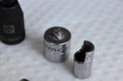 Knew it was risky with 1/4 drive adapter and socket but tried.