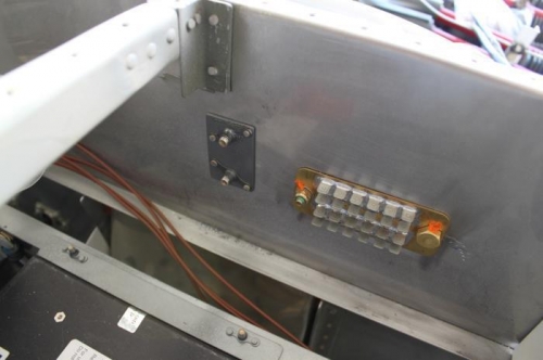 Nutplate doubler left of ground tabs.