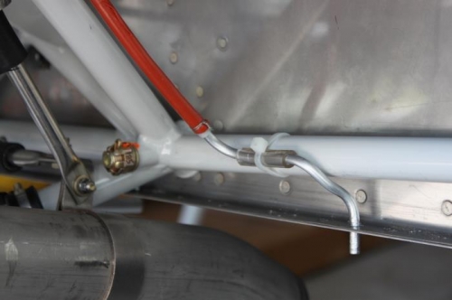 Bend the 3/16 OD tubing and drill #12 hole in firewall flange.