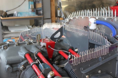 How to use the paperclips. The oil cooler mount will get similar trimming.