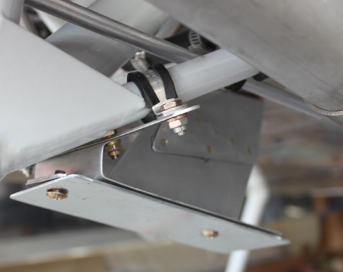 Cowl rests on the larger lower cover after sandwiching between it and the top plate.