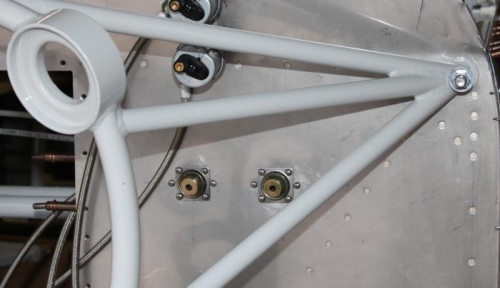 After taping the template on and center punching the 6 mounting holes and the large main opening.