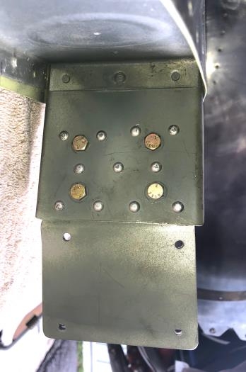 Normal pattern for holes would be 4-3-4.  4 bolt holes added for steel reinforcement.