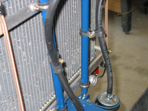 Fuel line with adel clamps