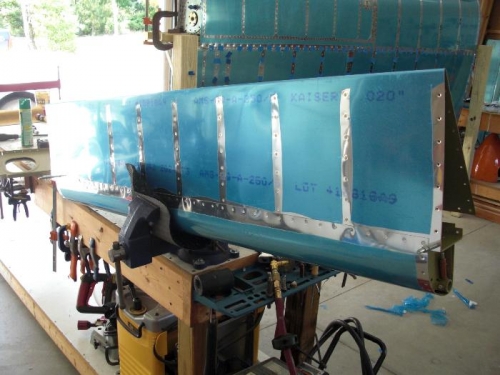 riveting leading and trailing skins