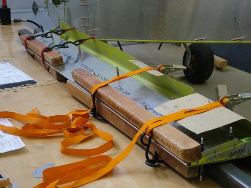 Folding skin over leading edge