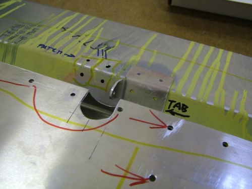 Cutout for trim tab linkage