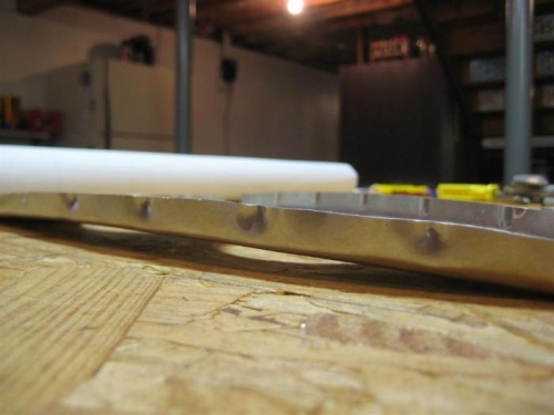 Rib does not sit flat after bending, even with the flutes started.