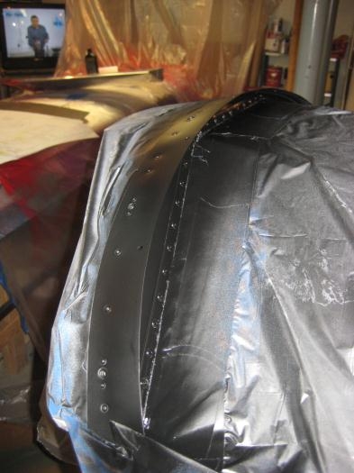 Flat black paint on the cowl strap and back side of firewall